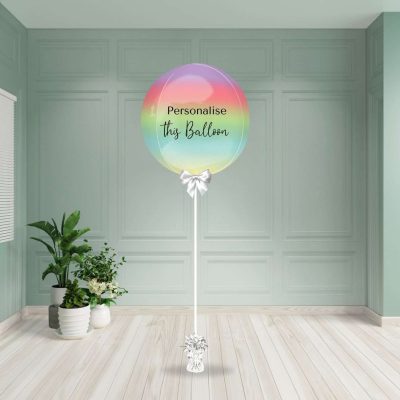 Round ombre rainbow helium inflated foil balloon with a smooth colour gradient