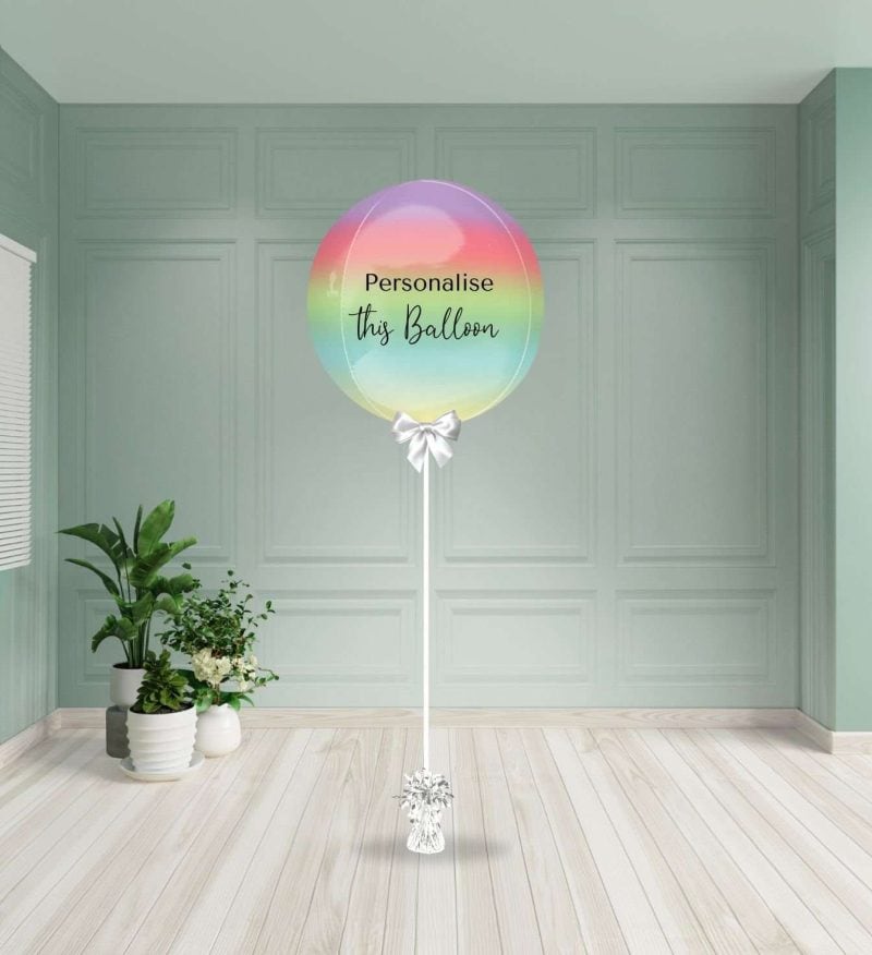 Round ombre rainbow helium inflated foil balloon with a smooth colour gradient