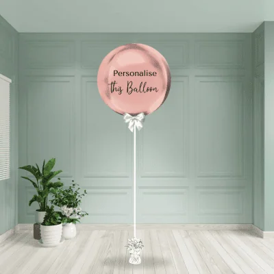 Rose gold round helium inflated foil balloon with a metallic finish
