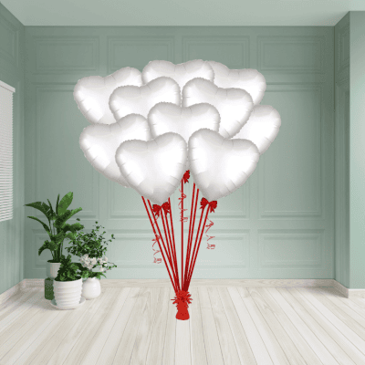 Sophisticated bouquet of satin white heart balloons, adding a touch of elegance to any celebration in London