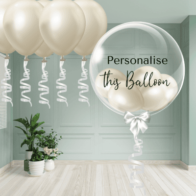 Personalised birthday bubble balloon gift with mini balloons and colour-matched base, delivered across the UK
