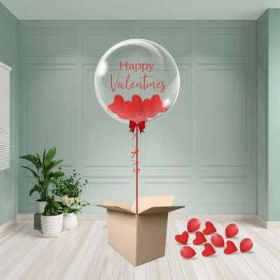 Personalised Valentine’s Day bubble balloon filled with confetti and styled for a romantic celebration