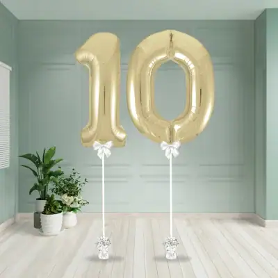 White gold 34 inch inflated number balloon styled for a celebration