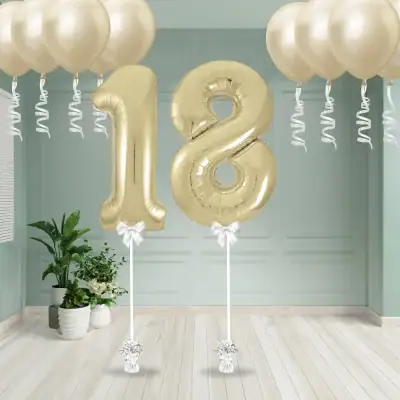 White gold number 18 foil balloons with matching ceiling balloons