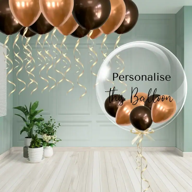 Brown and copper bubble balloon with ceiling balloons and cream curling ribbons