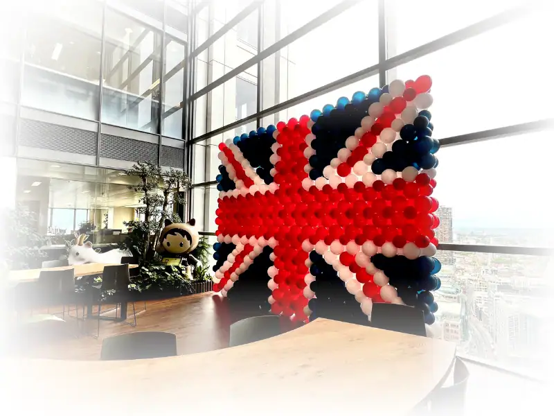 Union Jack balloon wall in London office with cityscape view